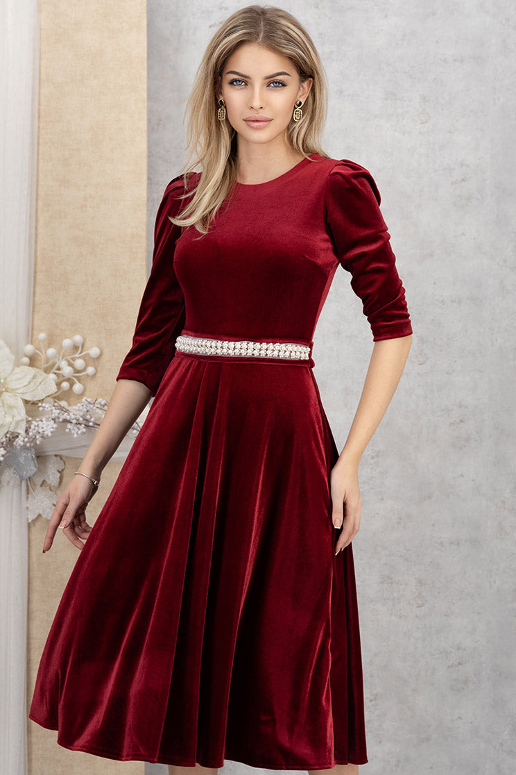 Burgundy Velvet Dress With Puffed Shoulders And A Belt Adorned With Pearl Embellishments