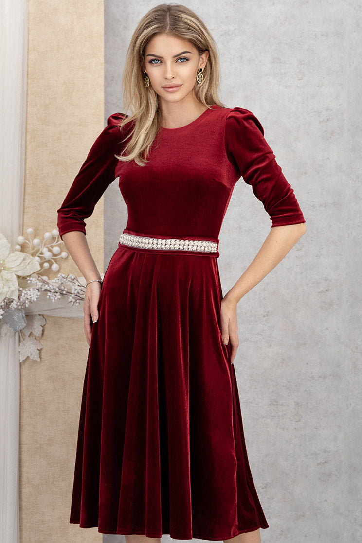 Burgundy Velvet Dress With Puffed Shoulders And A Belt Adorned With Pearl Embellishments