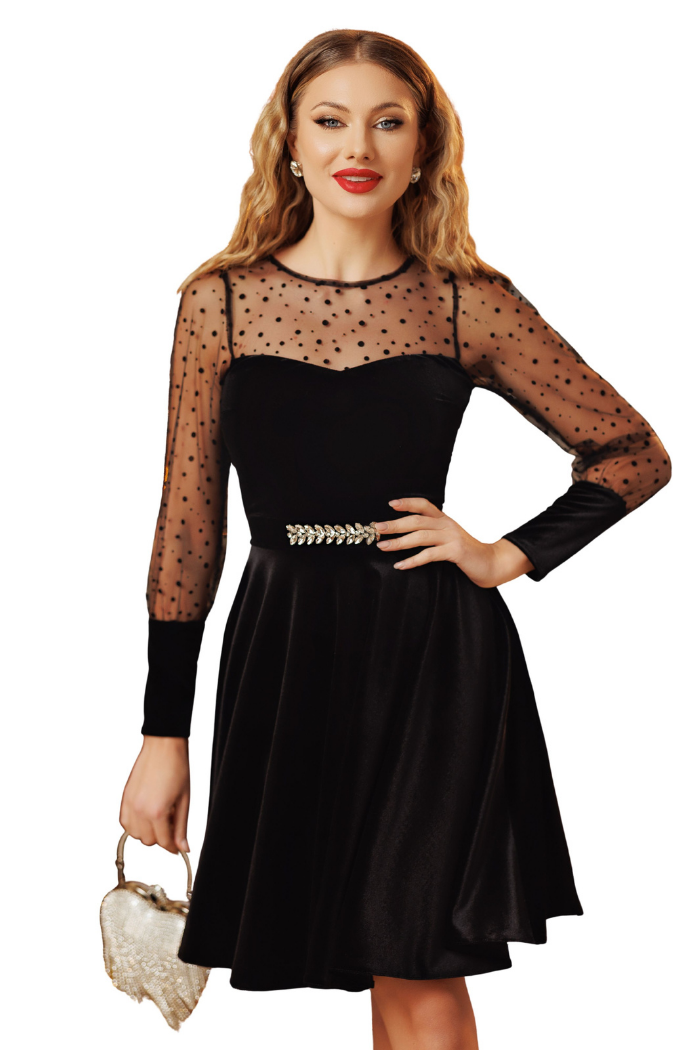 Elegant Black Velvet Occasion Dress With Striking Cutouts.