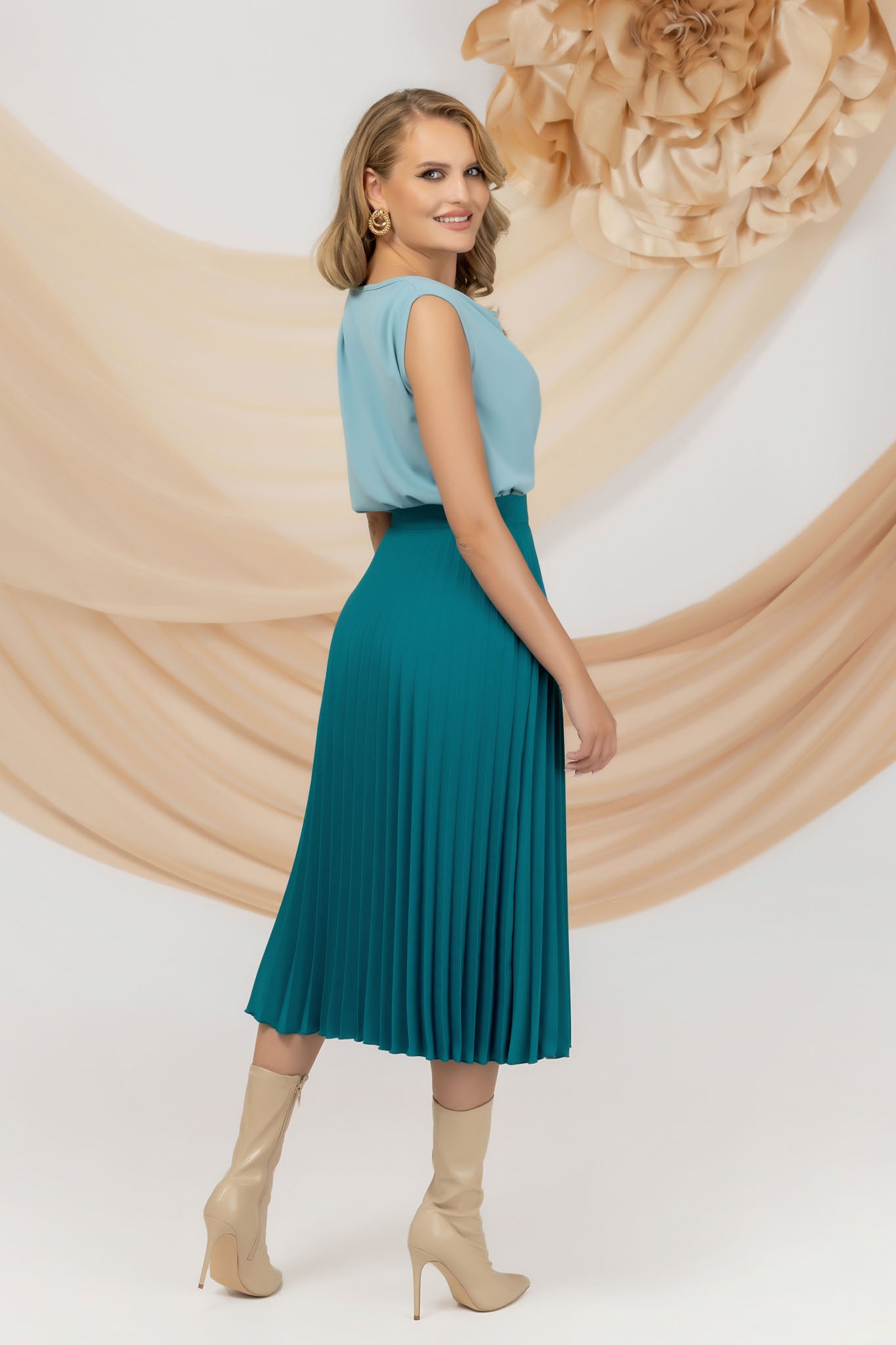 Mint Blouse With Frills On The Shoulders And A Loose Neckline At The Base Of The Bust
