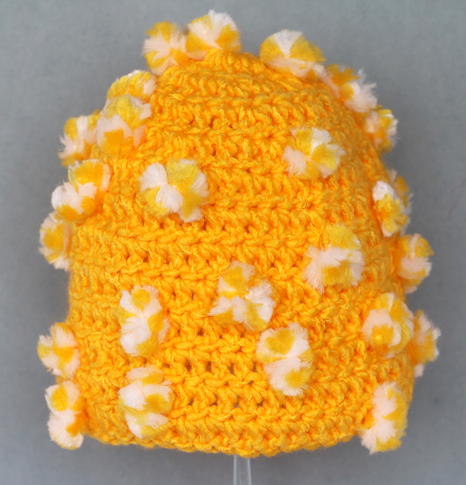 Yellow Hat With Many Small Pom Poms